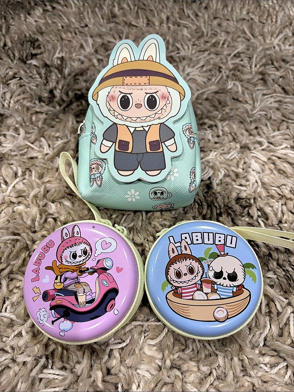 Labubu backpack/keychain and 2 Round Accessory Tins
